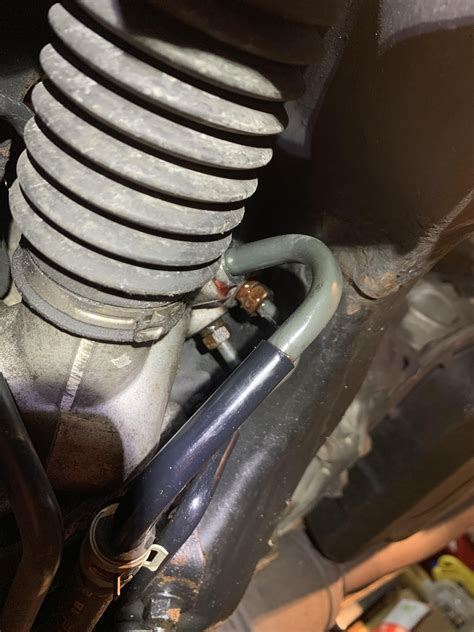 Leaking a decent amount of power steering fluid out of here. Tried