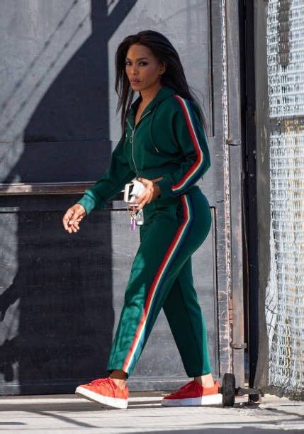 Pin By Maty Cise On Angela Bassett Pantsuit Fashion Pants