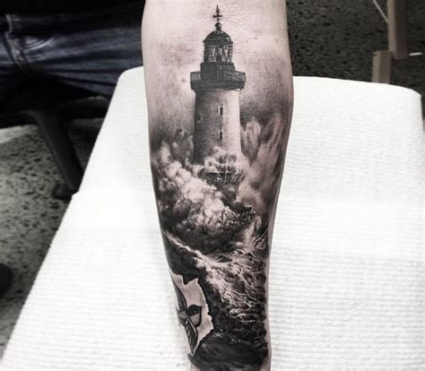 Photo - Lighthouse tattoo by Ben Kaye | Photo 18617 | Lighthouse tattoo, Ship tattoo sleeves ...