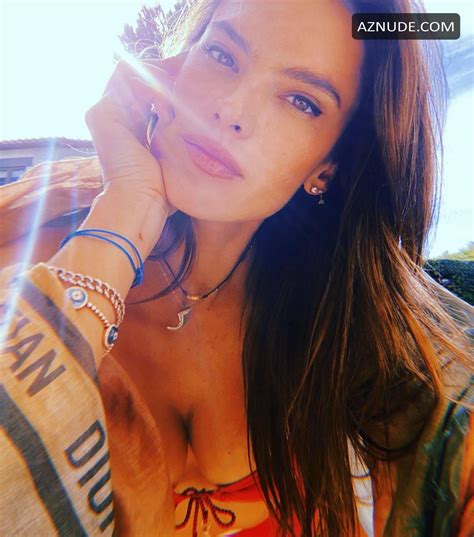Alessandra Ambrosio Shows Off Her Tits While Posing In A Red Bikini Top During Self Isolation At
