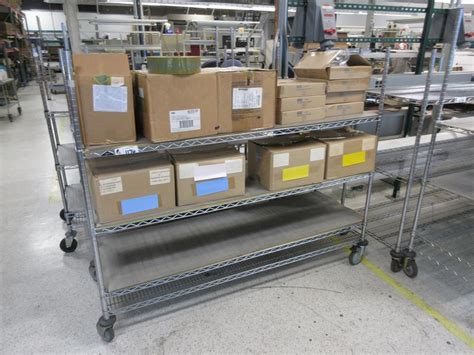 Machines Used Metro 4 Tier Rolling Wire Rack With Contents Of 28