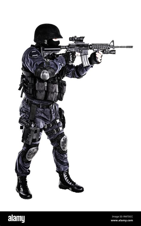 Special weapons and tactics (SWAT) team officer with his gun Stock ...