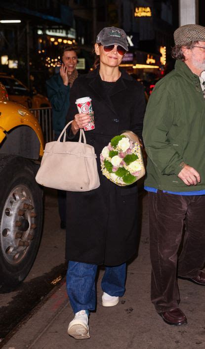 Katie Holmes Pairs Her Rich Looking Wool Coat With Classic Nike