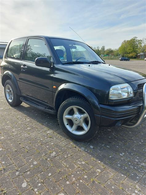 Suzuki Grand Vitara 2 0 Benzina Talmaciu OLX Ro