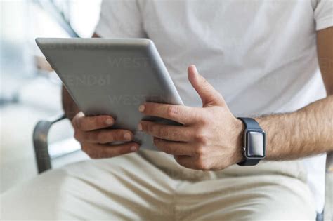 Man S Hands Holding Tablet Stock Photo