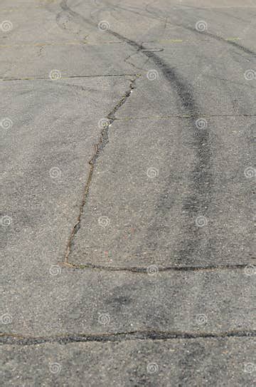 Gray Asphalt With Black Tire Tracks An Old Country Road With Cr Stock