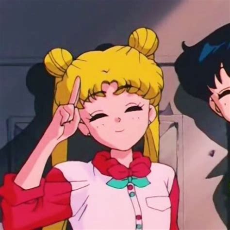 Two Anime Characters Standing Next To Each Other With Their Hands On Their Ears And Fingers Up