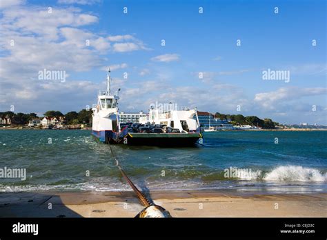 The Chain Ferry From Sandbanks Crosses The Mouth Of Poole Harbour To