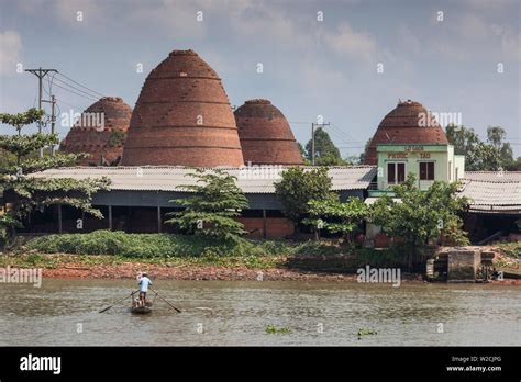 Vietnam, Mekong Delta, Sa Dec, Sa Dec River and brick kilns Stock Photo ...