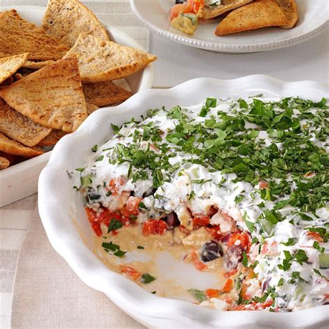 Layered Mediterranean Dip With Pita Chips Recipe Taste Of Home