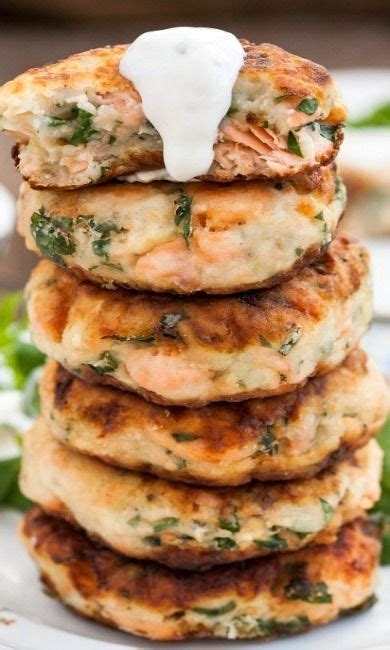 Salmon Cakes With Chive And Garlic Sauce Yummy Seafood Salmon Dishes Canned Salmon Recipes