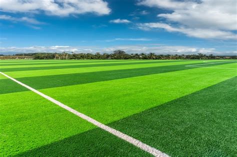 Premium Photo Football Pitch And A Cloudy Sky Green Field