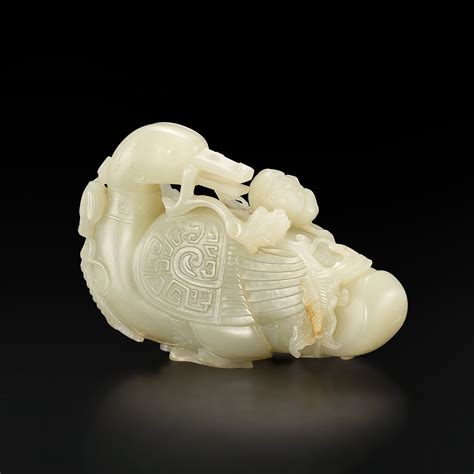 A White Jade Archaistic Duck And Lotus Group Qing Dynasty Th