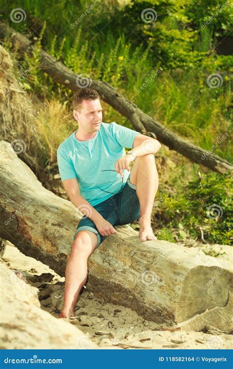 Handsome Man Relaxing On Beach During Summer Stock Photo Image Of