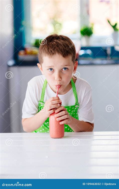 Child Boy Drinking Strawberry Smoothie Stock Photo Image Of Health