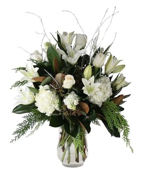 Joyous Winter Bouquet | Winter bouquet, Memorial flowers, Church flowers