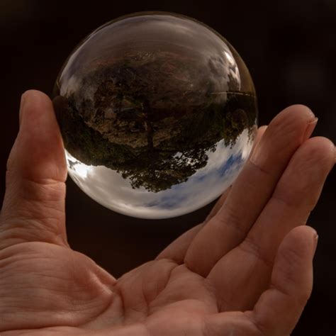 Premium Photo Cropped Hand Of Person Holding Crystal Ball