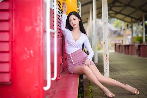 Pictures Skirt Brunette Girl Bokeh Young Woman Legs Asiatic Sit