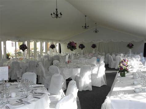 Swags Around Edge Of Marquee With Fairy Lights Wedding Venue