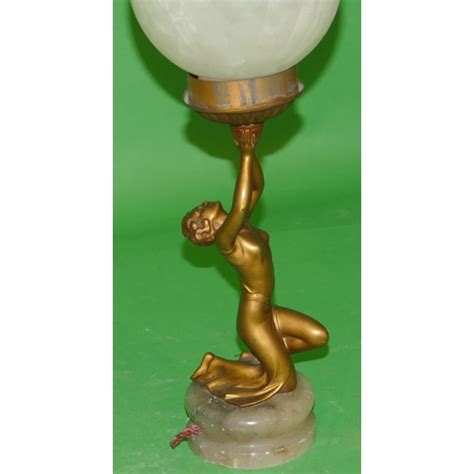 An Art Deco Gilt Spelter Table Lamp In Form Of A Kneeling Lady