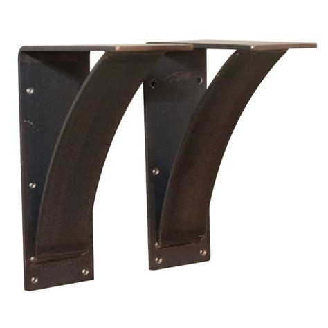 A Pair Of Metal Shelf Brackets On A White Background