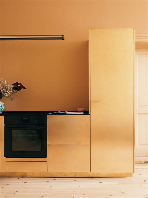 Reform creates brass doors for Ikea kitchen - Curbed