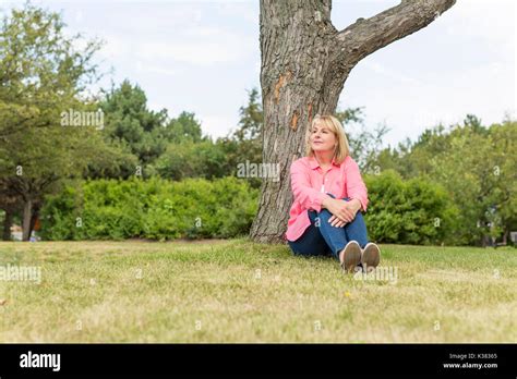 Mature Woman Outside Wearing In Pink Clothes Stock Photo Alamy