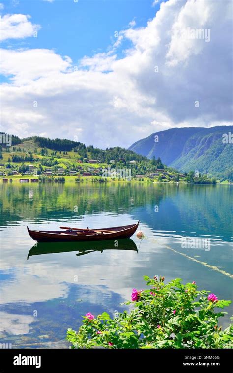 Beautiful Scenery Of A Boat In Ulvik Norway Stock Photo Alamy