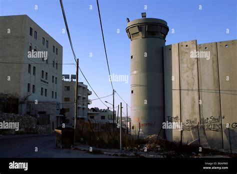 An Israeli Watch Tower On The Separation Wall Faces A Residential Building In Bethlehem