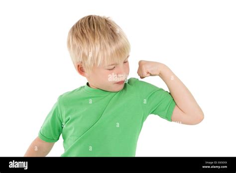 Cute Little Boy Flexing His Arm Stock Photo Alamy