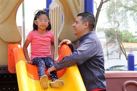 Divorced Dad With His Year Old Brunette Latina Daughter Play In The Park Games And Spend