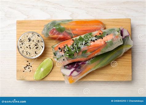 Delicious Rolls Wrapped In Rice Paper Served On White Wooden Table Top View Stock Image Image