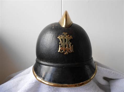 Leather Fire Helmet With Brass Emblem And Edges And Comb Catawiki