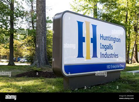 A logo sign outside of a facility occupied by Huntington Ingalls ...