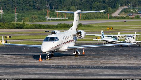 N Qs Netjets Aviation Embraer Emb Phenom Photo By Rohan A