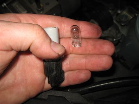 09 Honda Crv Headlight Bulb Replacement