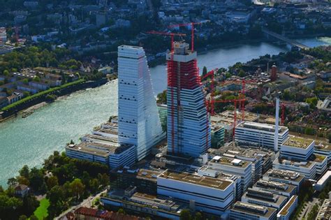 Luftbild Basel Erweiterungs Baustellen und Baukräne am Areal und