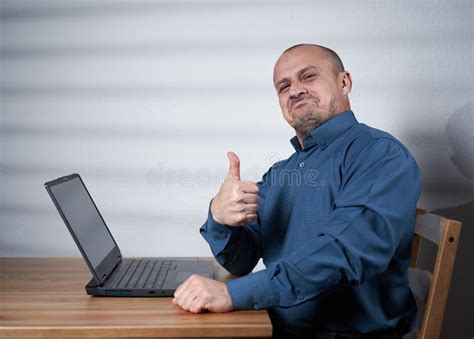 Mature Businessman With Laptop At His Desk Stock Photo Image Of Happy