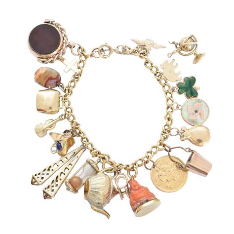 Lot 2 - A charm bracelet,