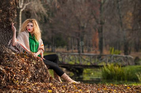 Beautiful Woman Posing In Park During Autumn Season Blonde Girl