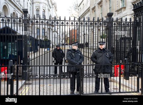 Metropolitan Police Armed Protection Officers Outside The Security