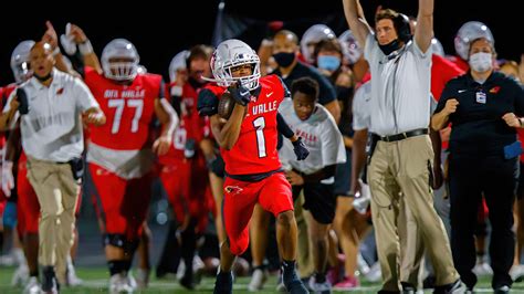 High school football: Westlake, Lake Travis flash defense in 26-6A