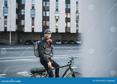 Male Bicycle Courier with Backpack and Sunglasses Delivering Packages ...