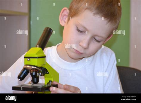 the boy with a microscope Stock Photo - Alamy
