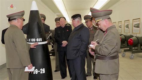 North Korea Unveils New Nuclear Warheads As Us Air Carrier Arrives In