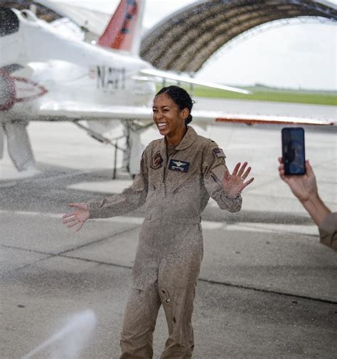 Ltjg Swegle Celebrates At Her Graduation As The First Black Female Tactical Jet Pilot In Us Navy