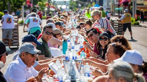 As part of the Shediac Lobster Festival in New Brunswick, over 400 people sat down together — at ...