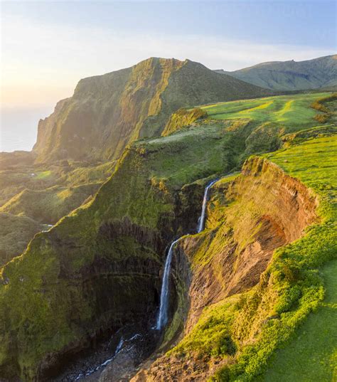 Aerial View Of A Waterfall In Ribeira Grande Lake On Ilha Das Flores