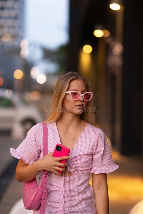 Gen Z Girl In Pink Outfit Before Going The Cinema To Watch Movie The