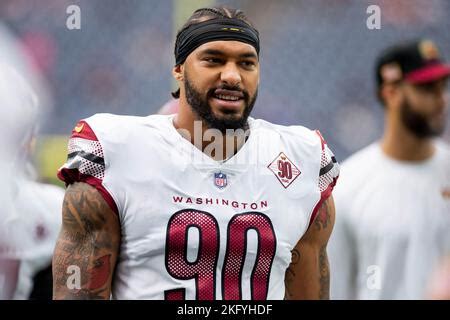 Washington Commanders defensive end Montez Sweat (90) celebrates a sack ...